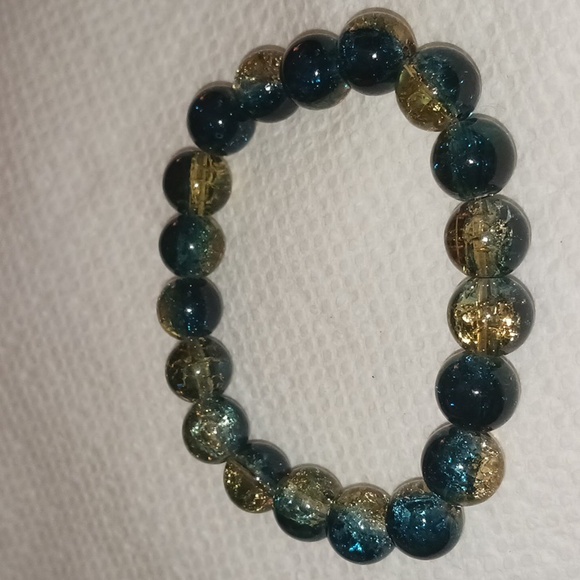 None Jewelry - Sparkly blue and gold stretchy glass bead bracelet